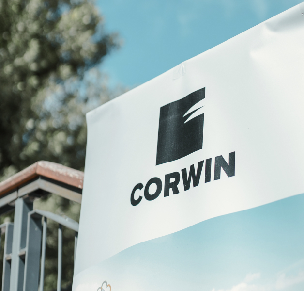 The logo of Corwin real estate developer on an advertising banner in Bratislava